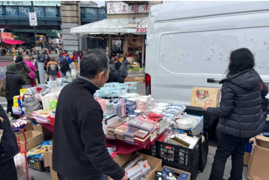 Chinese Community in Flushing, New York: Shoppers Stock Up on Chinese-Imported Goods at Street Stall